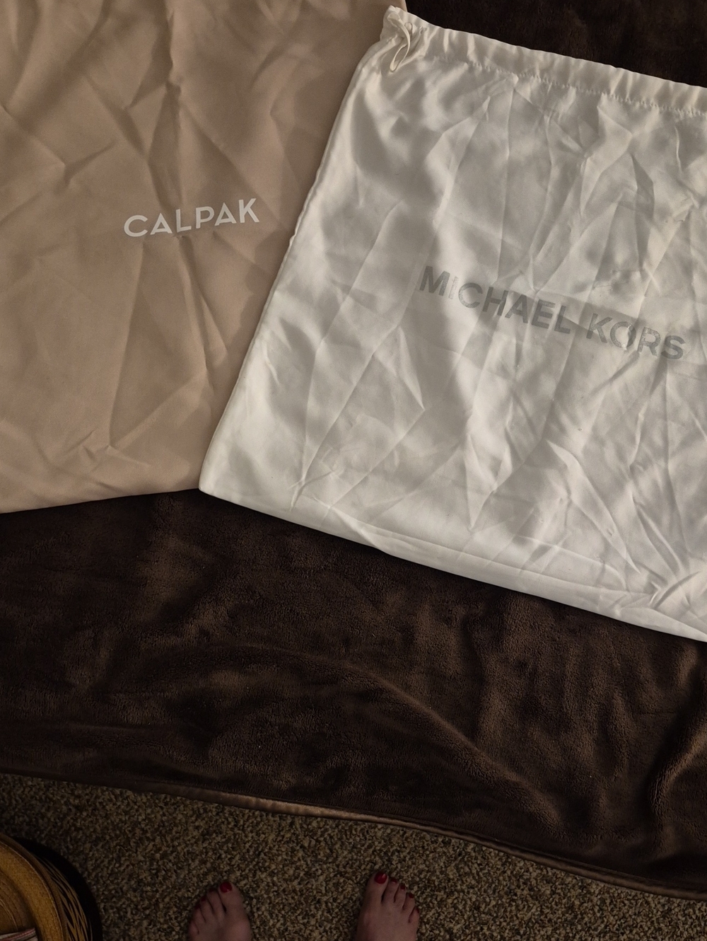 Michael Kors White Dust Bag & Calpak Beige Travel Pouch